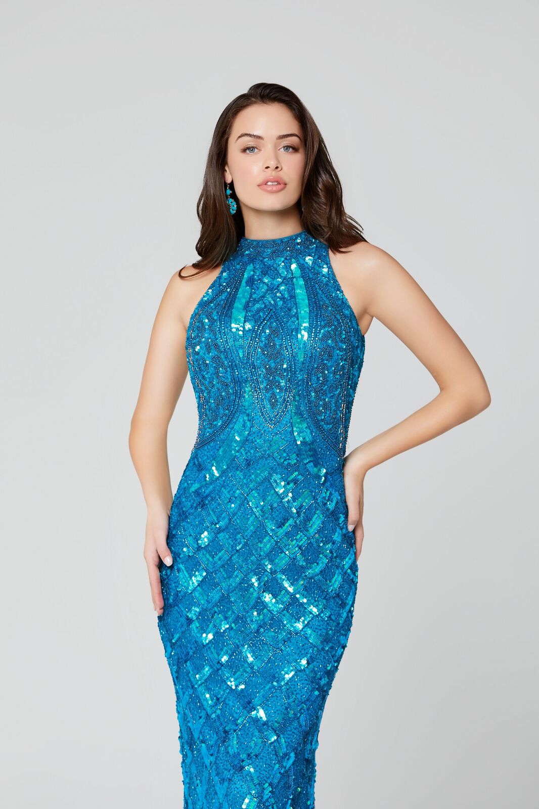 Primavera Couture 3442 high neckline and high back sleeveless fully beaded sequins evening gown.  Beaded High Neckline Prom Dress Formal Evening Gown.  Available colors:  Peacock  Available sizes:  18