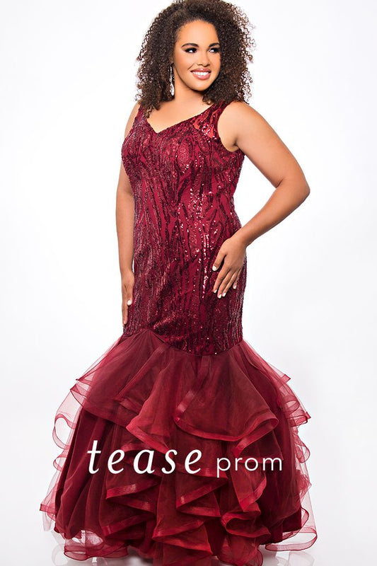 Tease Prom TE2048  embellished mermaid plus size prom dress.  ﻿Red carpet ready!  Be glamorous wearing a luxurious sequin mermaid dress with tiered skirt. Heavily sequined V-bodice, illusion straps, and V-back center zipper flatter your curves. Fit-and-flare style with a tiered tulle skirt is very sexy for your prom night.  Perfect for the Queen who wants to be trendy and seductive for Prom