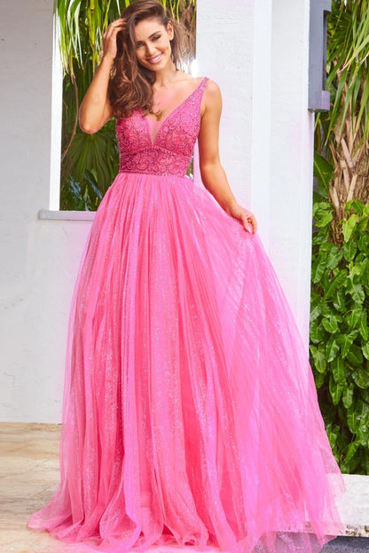 Jovani JVN05818 - JVN 05818 is a Gorgeous Long Glittering Tulle A Line ballgown prom dress. Featuring a sheer Fitted V Neckline bodice with crystal rhinestone embellishments. Open V Back. Look like a princess in this stunning formal evening gown.  Fuchsia size 8  Available Sizes: 00,0,2,4,6,8,10,12,14,16,18,20,22,24  Available Colors: Blush, Fuchsia, Light Blue