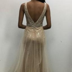 JVN2343 Embellished Prom Dress with a plunging neckline. Fitted gown with a stretch shimmer glitter is overlayed with flowing tulle sheer skirt. crystal embellished bodice with Deep v Neckline and embellished waistband. Evening gown mother of the bride groom gown. 