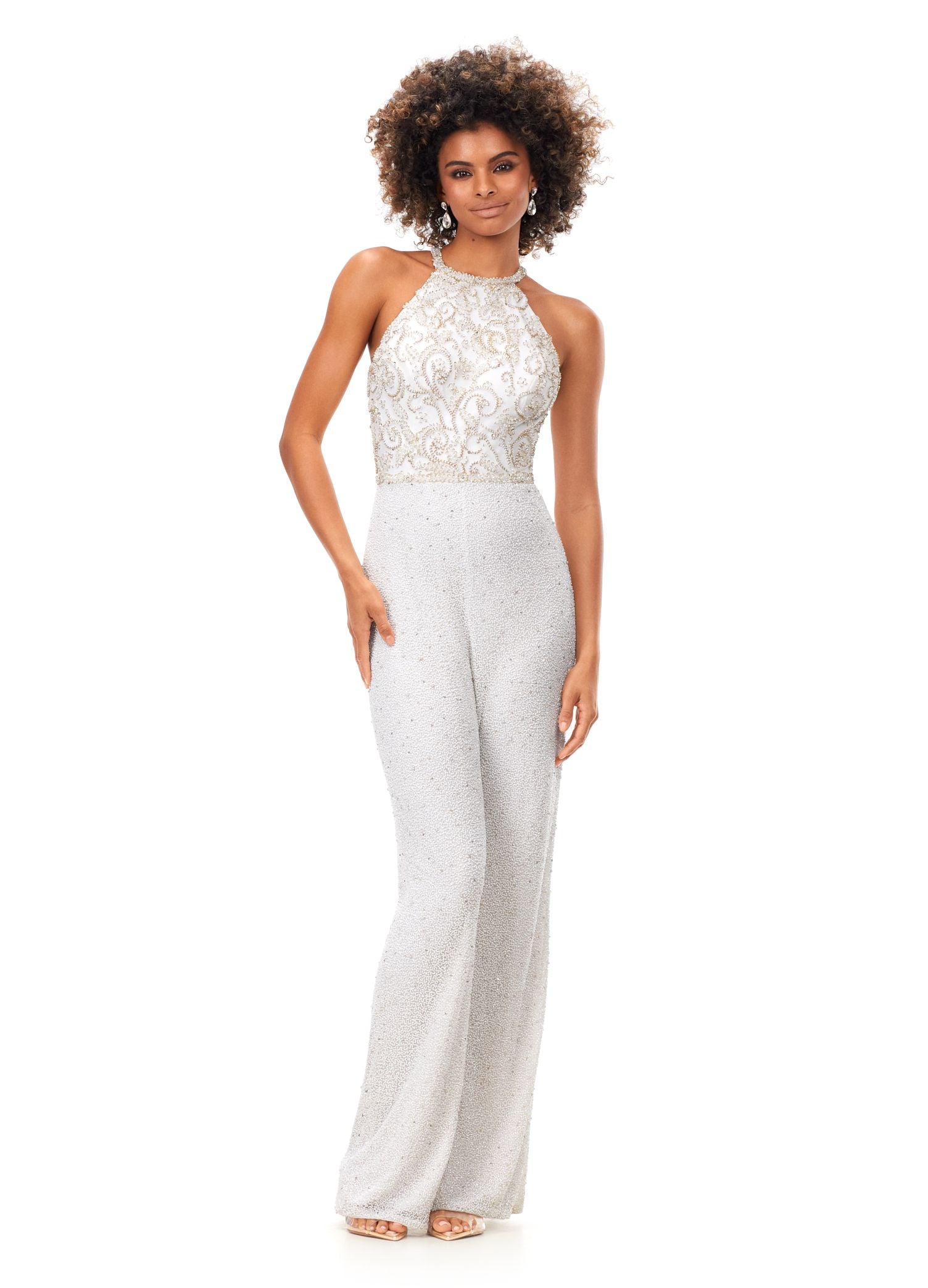 Ashley Lauren 11339 This unique halter style jumpsuit features an intricately beaded bodice, open back and wide leg pants. Halter Neckline Open Back Wide Leg Pants Fully Hand Beaded COLORS: Black, Ivory, Lilac