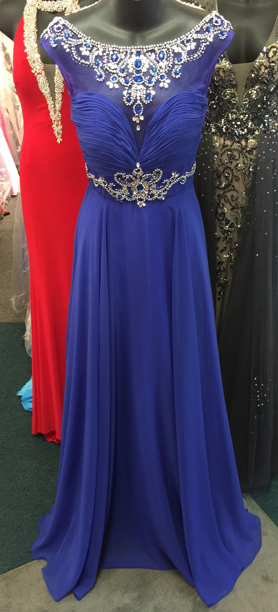 Precious Formals Lux Gal style L 70118 in size 0 Royal blue is a chiffon prom gown with illusion hand beaded top and intricately hand beaded belt and an extra layer of flowing chiffon on the over skirt.  Embellished sheer high neckline evening gown pageant dress. 