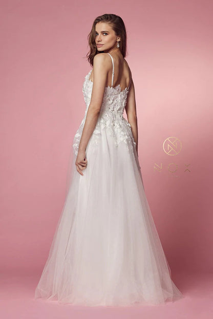 Nox Anabel R346 Long A Line 3D Floral Lace Wedding Dress Bridal Gown. Sleeveless, 3D Floral Appliques, Rhinestones, Illusion Inset, Spaghetti Straps, Embroidery, Mid-Open Back, Back Zipper, Sweep Train 3-dimensional floral appliques and shimmering jewels, this ensemble shows a deep v-neckline with an illusion inset. The back is designed with a mid-open accent as trailing embroidered details trail from the waist. The ethereal A-line skirt softly flutters into a full-length hemline. 