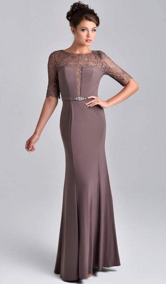 Nina Canacci M218 This stunning evening gown features a scoop neckline with three quarter length sleeves. Sheer lace wraps the top, glides down the center bodice and rounds the slim waist. Accenting the front side of the band are clustered beads that add sparkle and flair. The slim silhouette will showcase your best figure with the full length hem completes the impressive look. Available Sizes: 6, 8, 10  Available Colors: Taupe