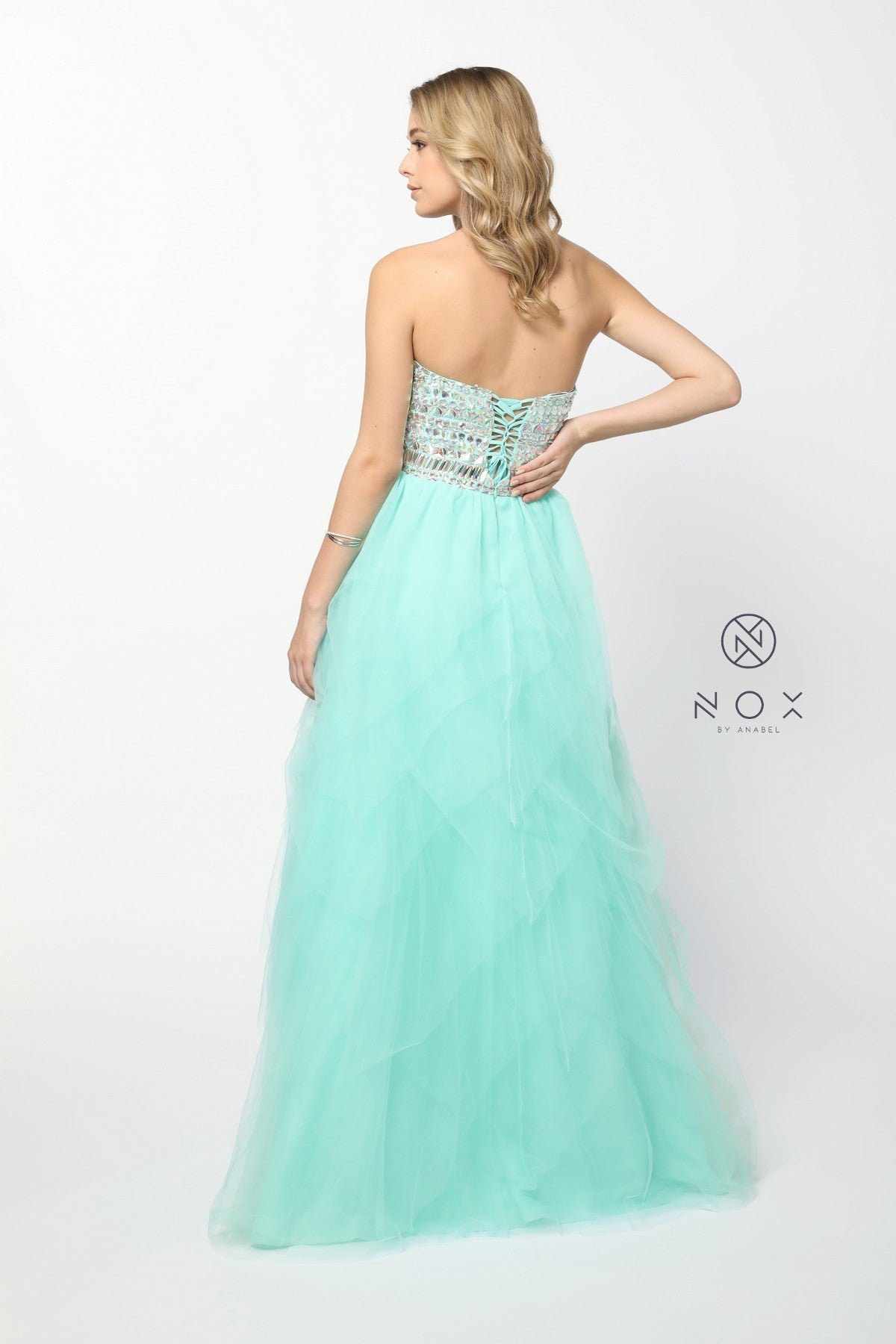 Nox Anabel 2740 Crystal Rhinestone Bodice with lace up corset back. A Line ballgown skirt with layered tulle for a fairy style design! Prom Dress Tulle A line Layered Skirt Formal Ballgown  Available Size & Colors:  Size 2 Lavender  Size 4 Baby Pink  Size 6 Mint Green