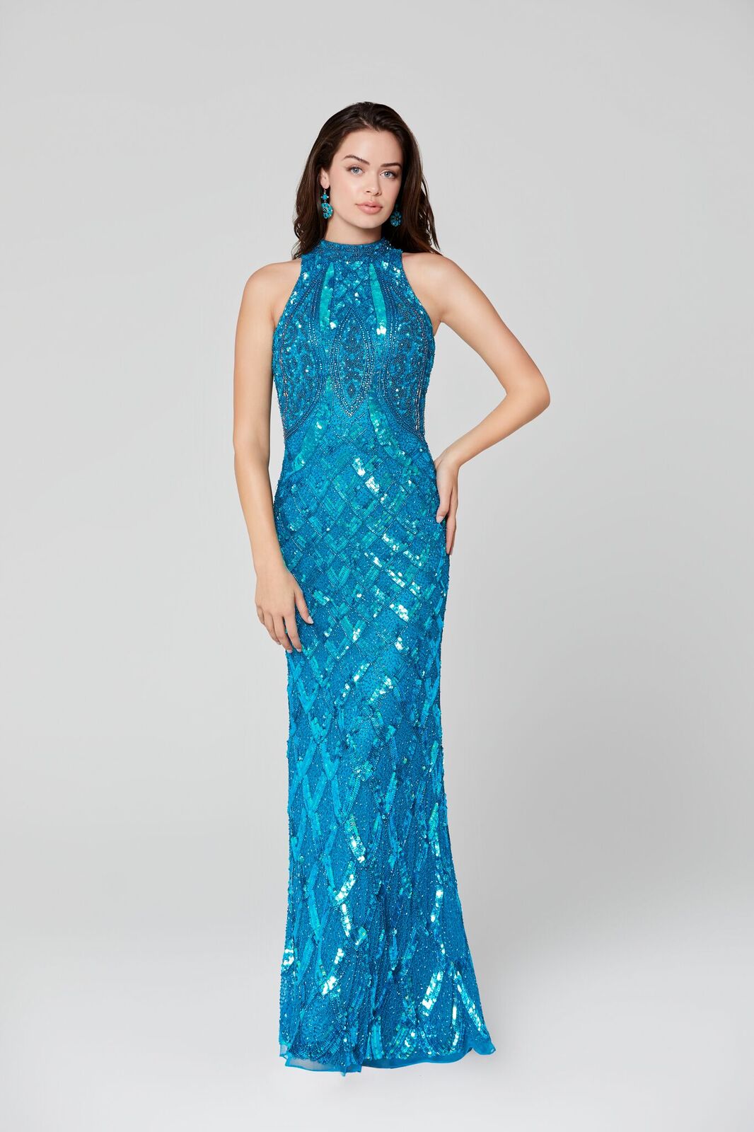 Primavera Couture 3442 high neckline and high back sleeveless fully beaded sequins evening gown.  Beaded High Neckline Prom Dress Formal Evening Gown.  Available colors:  Peacock  Available sizes:  18