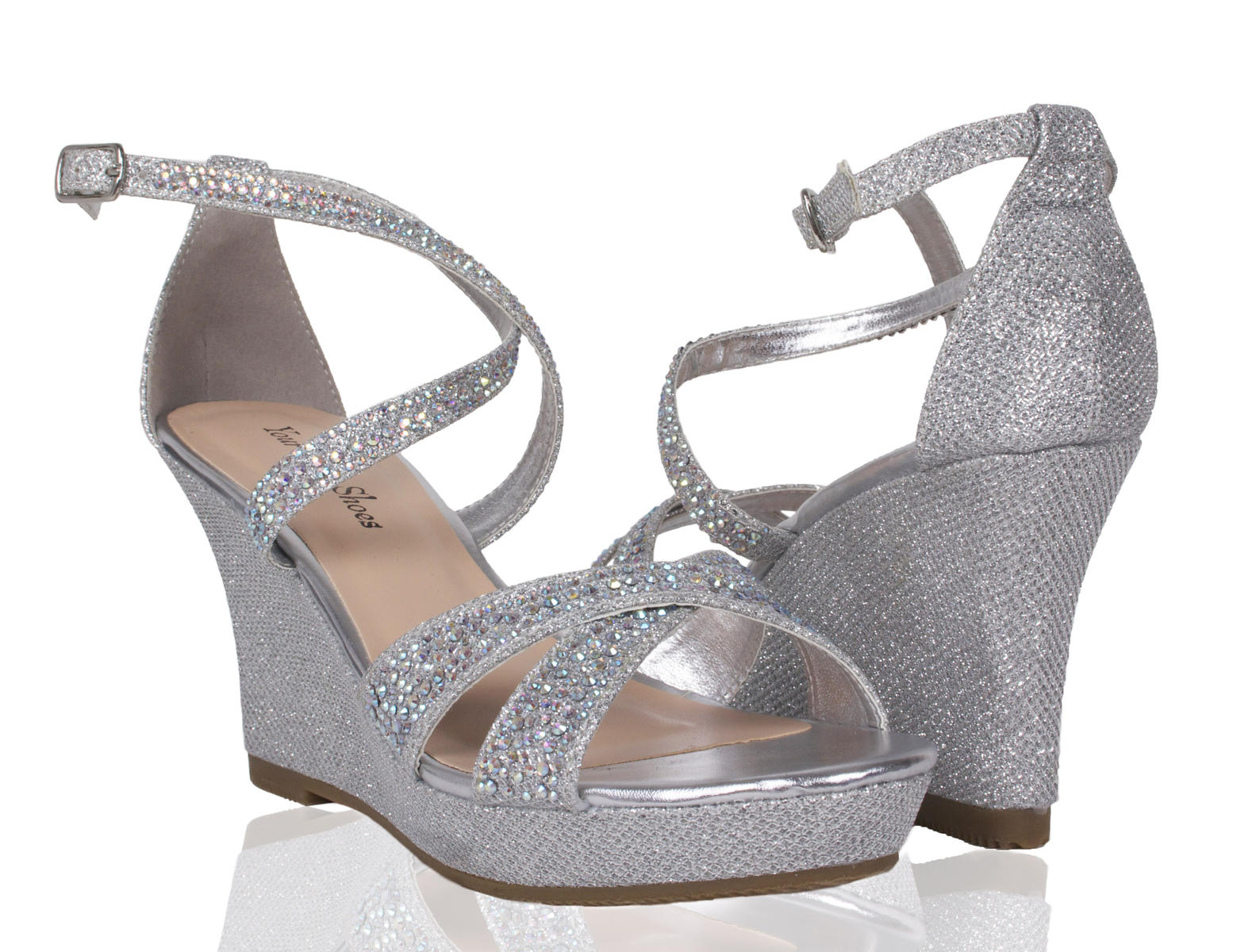 Your Party Shoes Paige Stunning Glitter High Wedge Heel with Crystal Embellished Straps & Ankle Fastener. Perfect For Prom, Homecoming or any Social, Formal or Special Occasion! Great shoes for for any Event. Rhinestone Accented straps add security for comfortable wear. Great for wide feet.  Style 714 - Black  Style 715 - Silver  Style 716 - Nude  Description: Heel Height: 2 3/4 Platform Height: 1  Available Sizes: 5, 5.5, 6, 6.5, 7, 7.5, 8, 8.5, 9, 9.5, 10, 10.5, 11